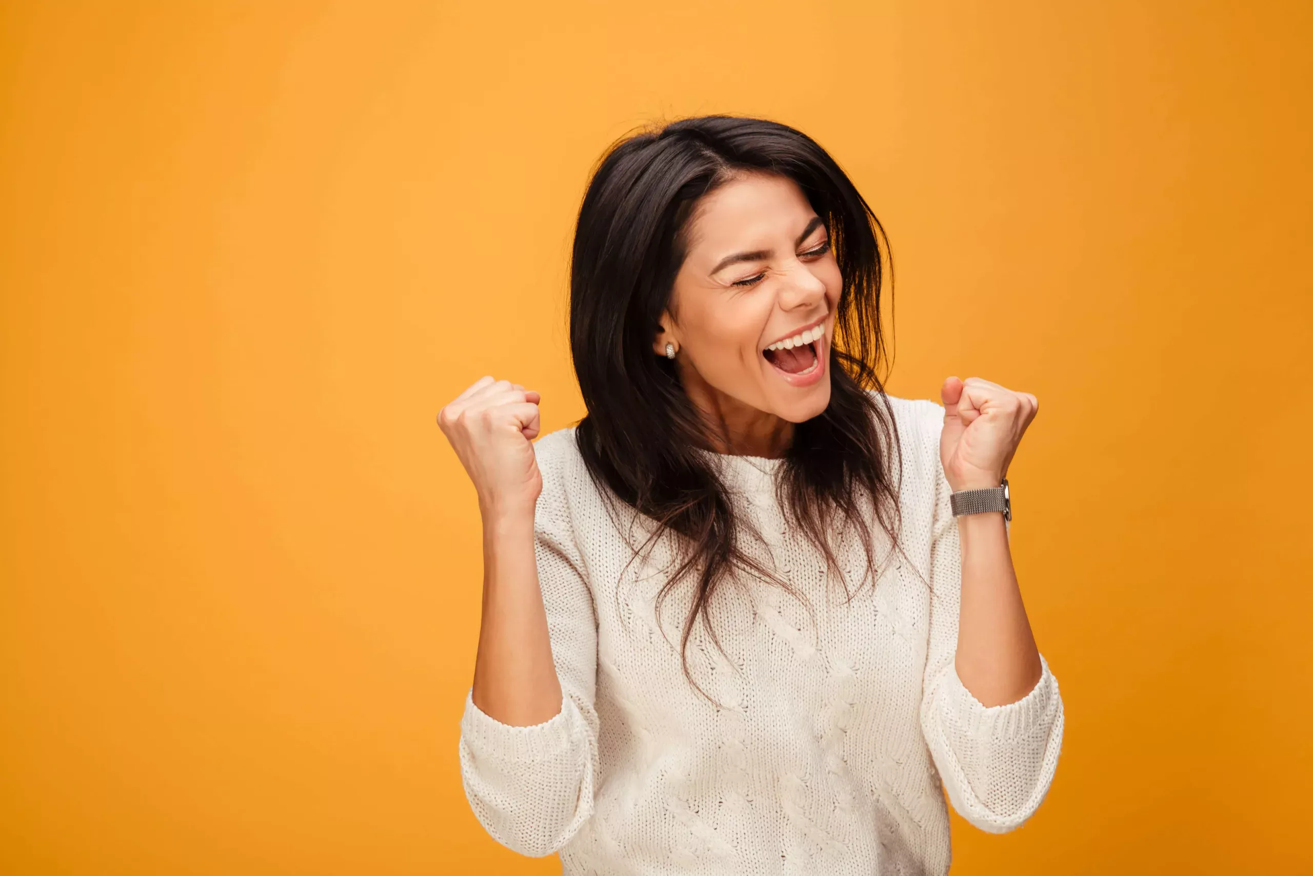 portrait-excited-young-woman-celebrating-success-min